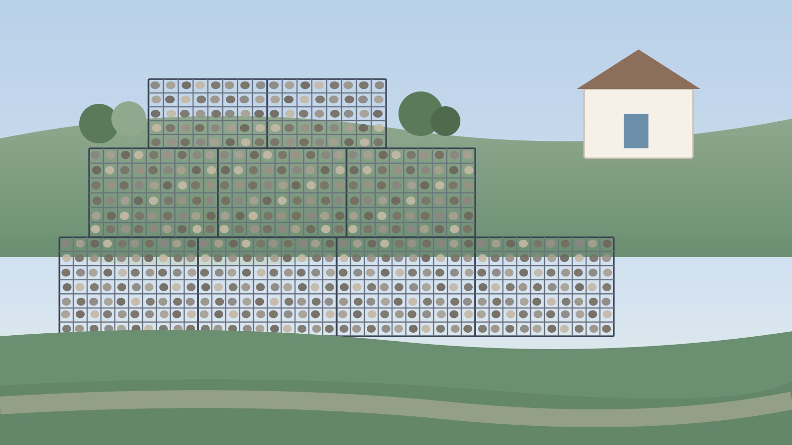 Stacked gabion baskets filled with natural stone forming a low landscape wall in a backyard